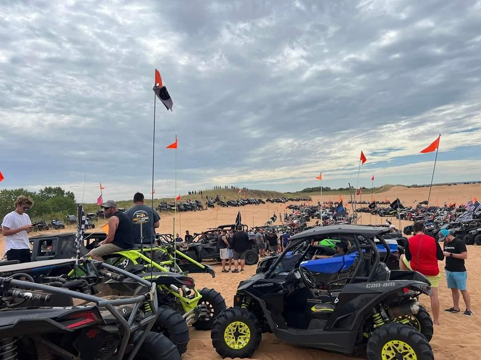 Side by sides gathered at an off road event